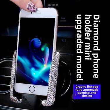 Cross-border car Diamond-embedded mobile phone bracket navigation frame dual-purpose air outlet seat Gravity Mobile phone bracket female bracket_autovado.com